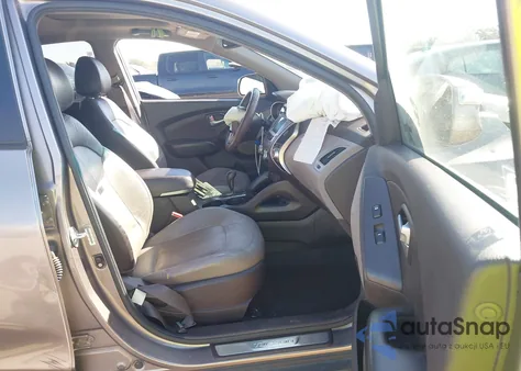 2012 Hyundai Tucson Limited z USA, uszkodzony, nr VIN KM8JU3ACXCU421378